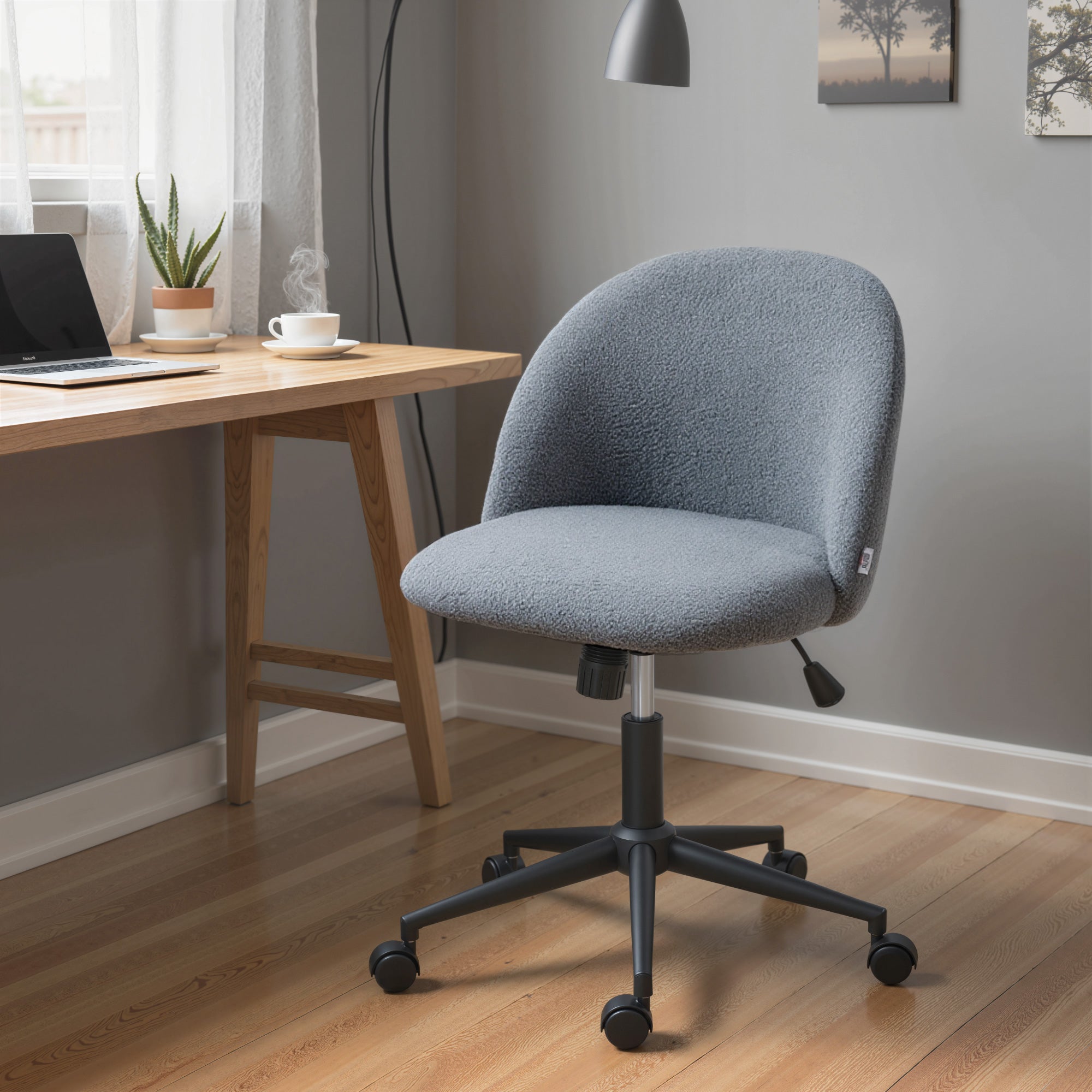 Gray teddy fleece office chair with rounded back and black metal base perfect for home or office use
