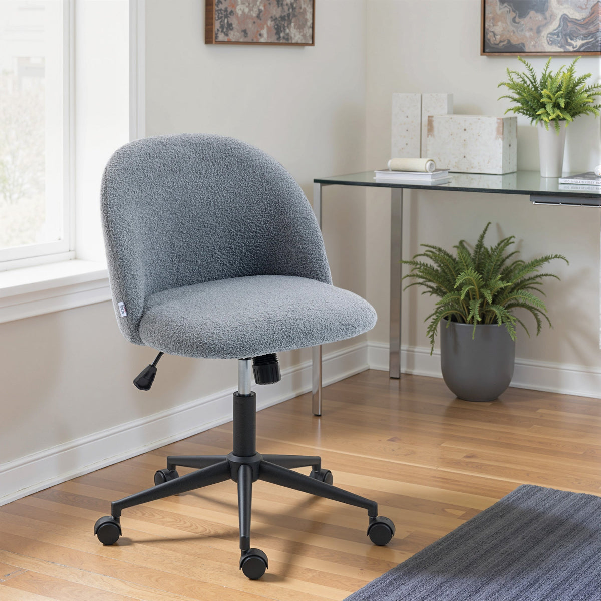 Gray fuzzy teddy fleece office chair with black metal base and wheels perfect for home or office use