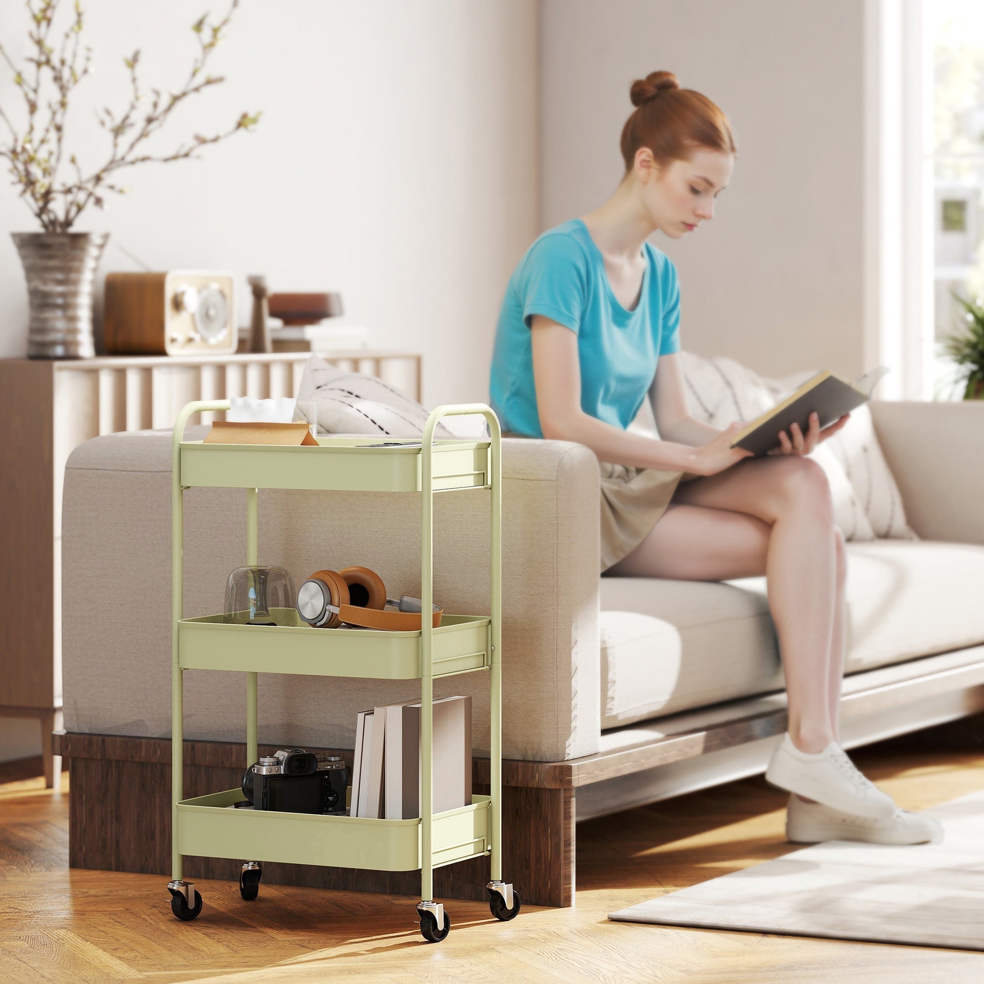 Green homcom three-tier steel utility cart with large basket and four black wheels on minimalist metal frame