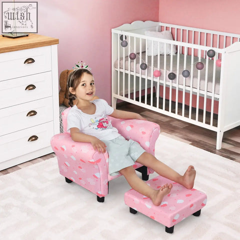 Pink toddler armchair with wood frame cute cloud upholstery white heart pattern and black anti slip legs for playroom