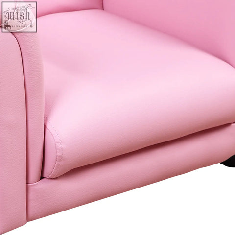 Pink faux leather kids sofa chair with smooth padded upholstery and clean stitching for extra comfort in toddler use