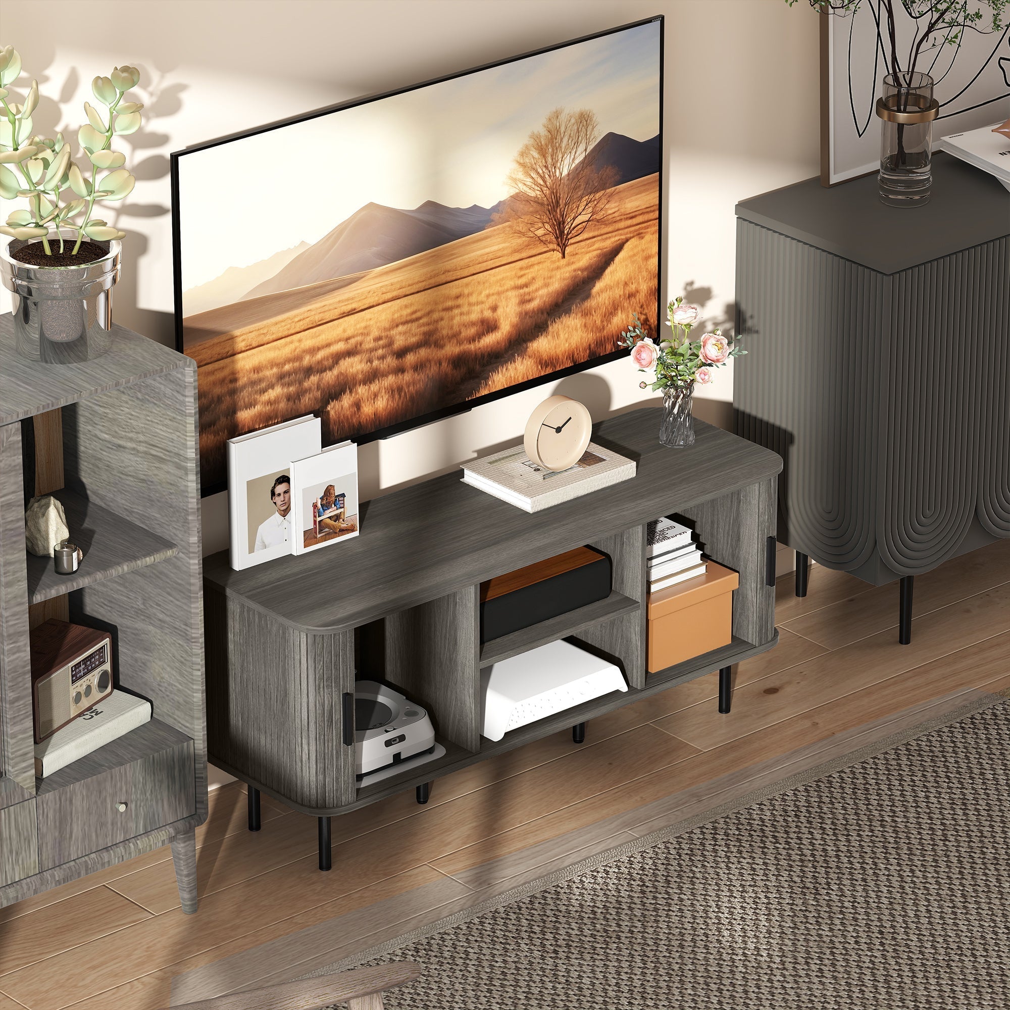 Modern grey wood grain tv stand with sleek black legs and open shelving offers storage space and high weight capacity for living room