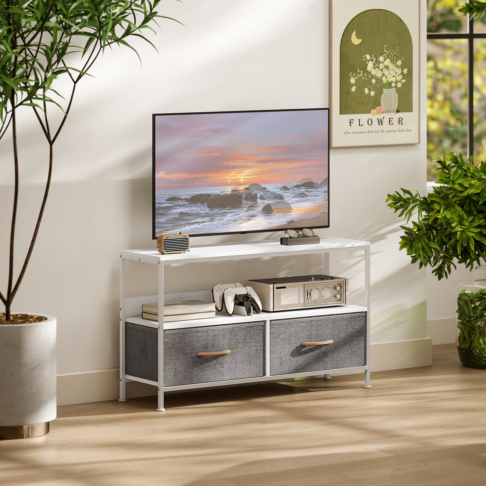 White metal-framed tv stand with dual colours gray fabric drawers and wooden handles perfect for living room storage