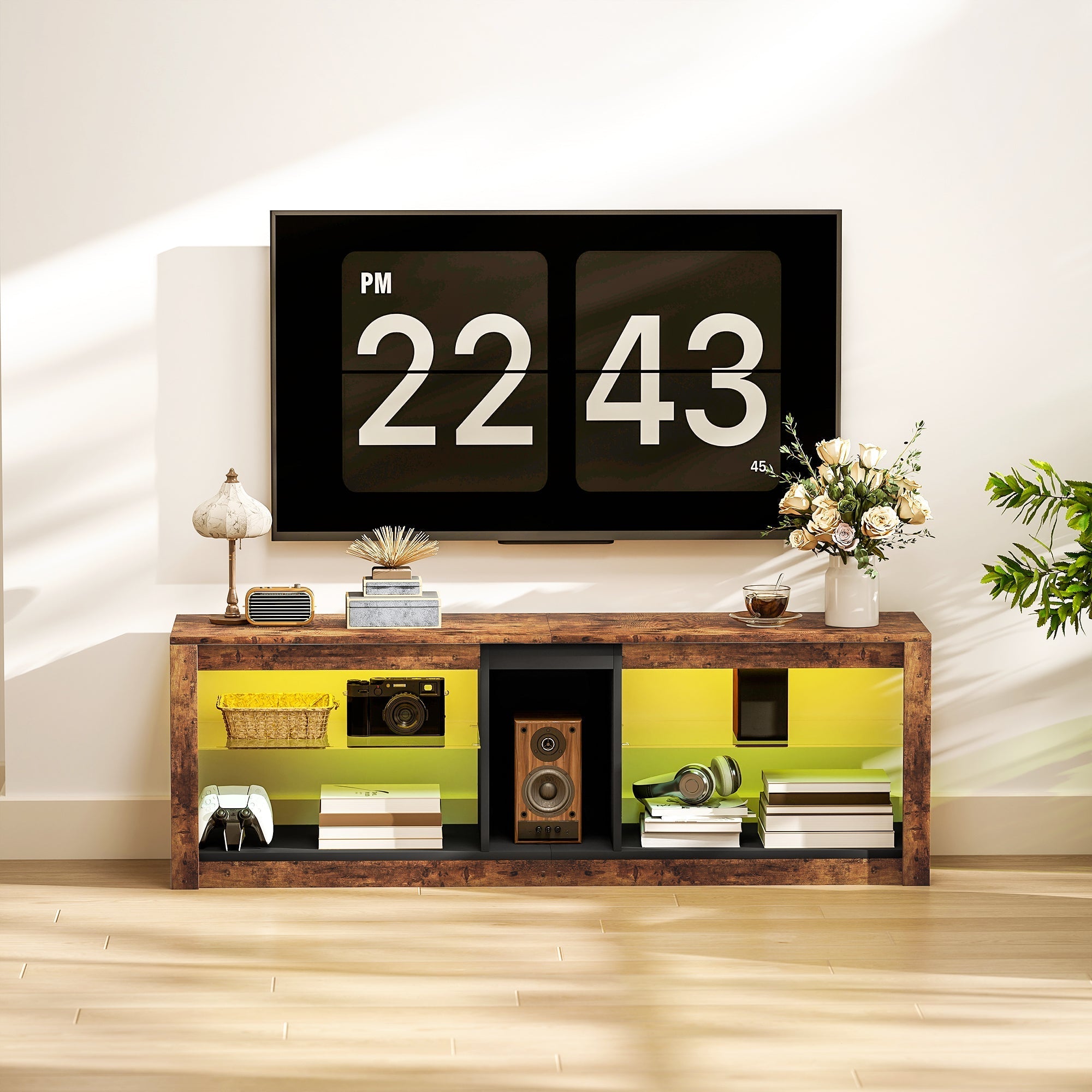 Black digital flip clock showing 22 43 pm on homcom tv stand with remote control and removable led light in rustic brown