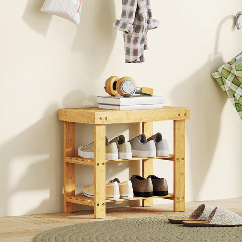 Light-colored bamboo shoe bench with two slatted shelves and natural finish for shoe storage from homcom
