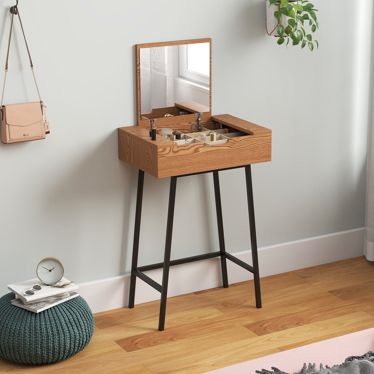 A homcom vanity desk with flip-up mirror and 16 compartments in natural wood effect and black metal legs