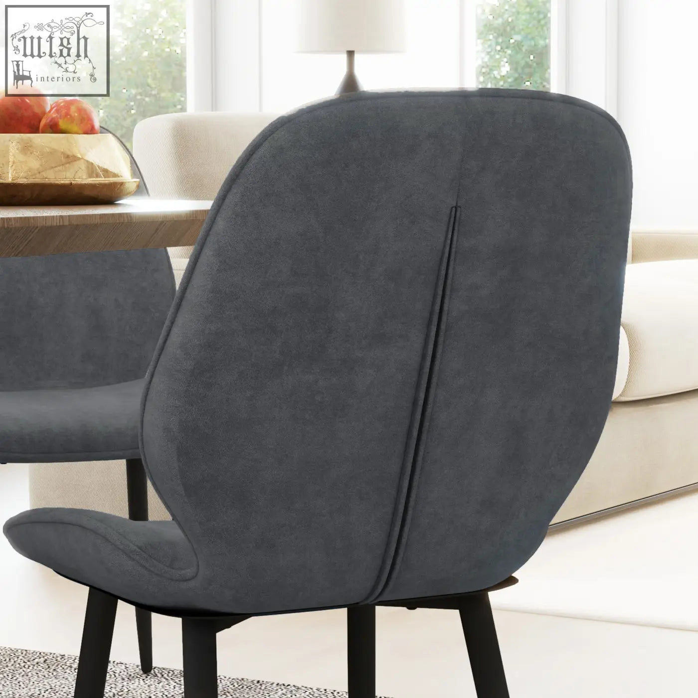 Modern grey velvet dining chairs with sleek powder coated steel legs perfect for living and dining rooms