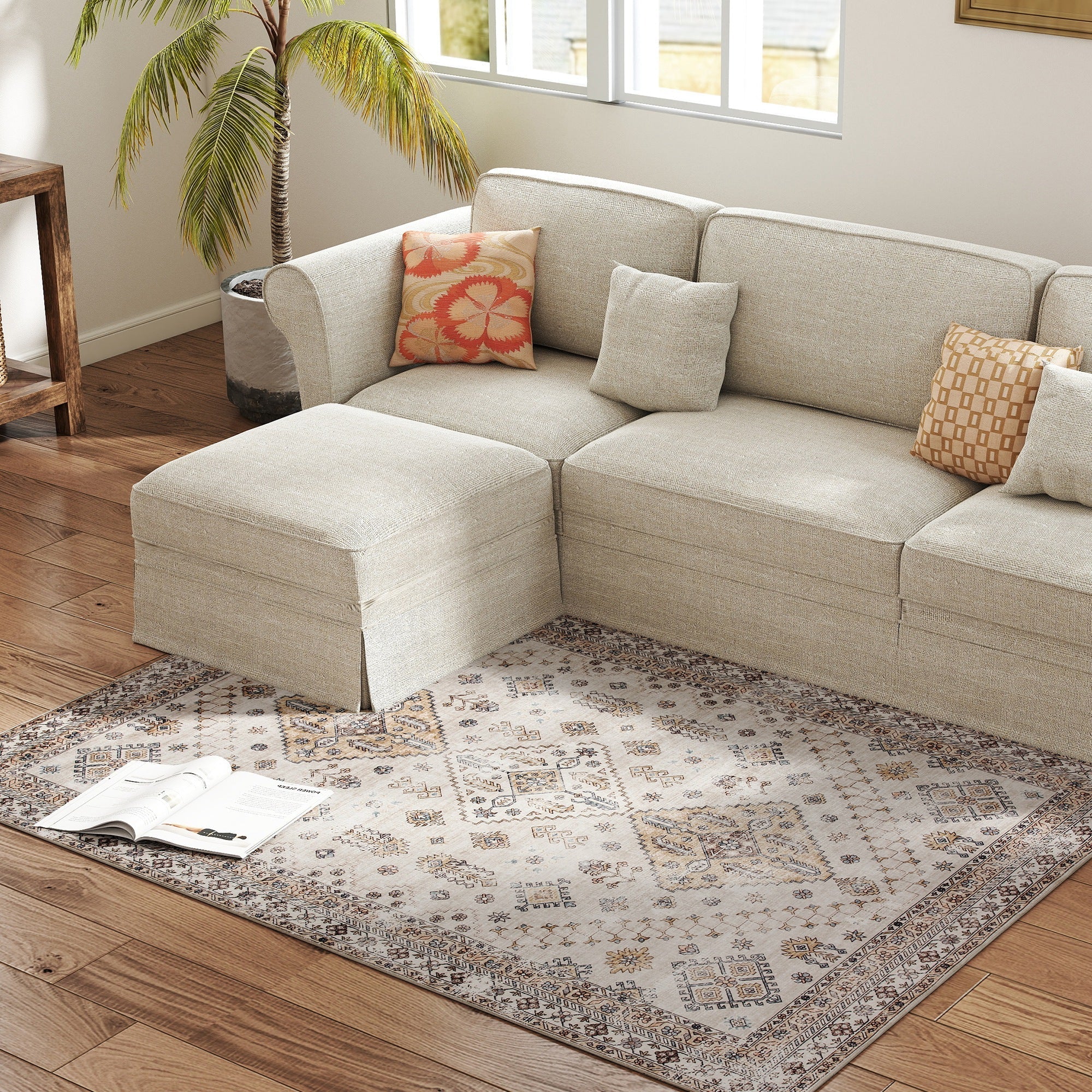 Beige sectional sofa with textured fabric and patterned pillows on a homcom vintage area rug for plush comfort underfoot in living room