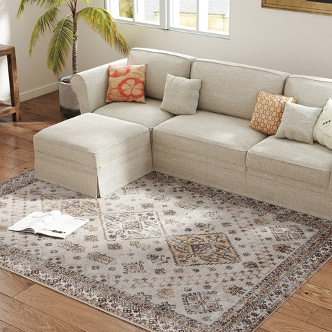 Beige sectional sofa with textured fabric and matching ottoman on homcom vintage area rug for plush comfort underfoot in living room