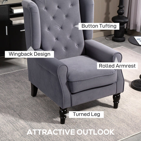 Gray velvet wingback accent chair with button tufting and turned legs in charcoal grey floor height for living room