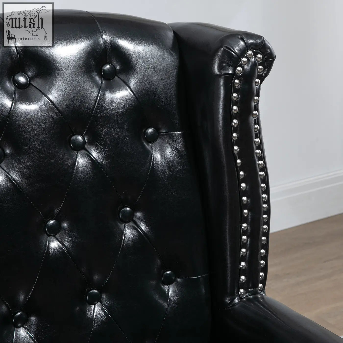 Black HOMCOM wingback accent chair with tufted leather seat cushion and eucalyptus wood frame for living room or bedroom