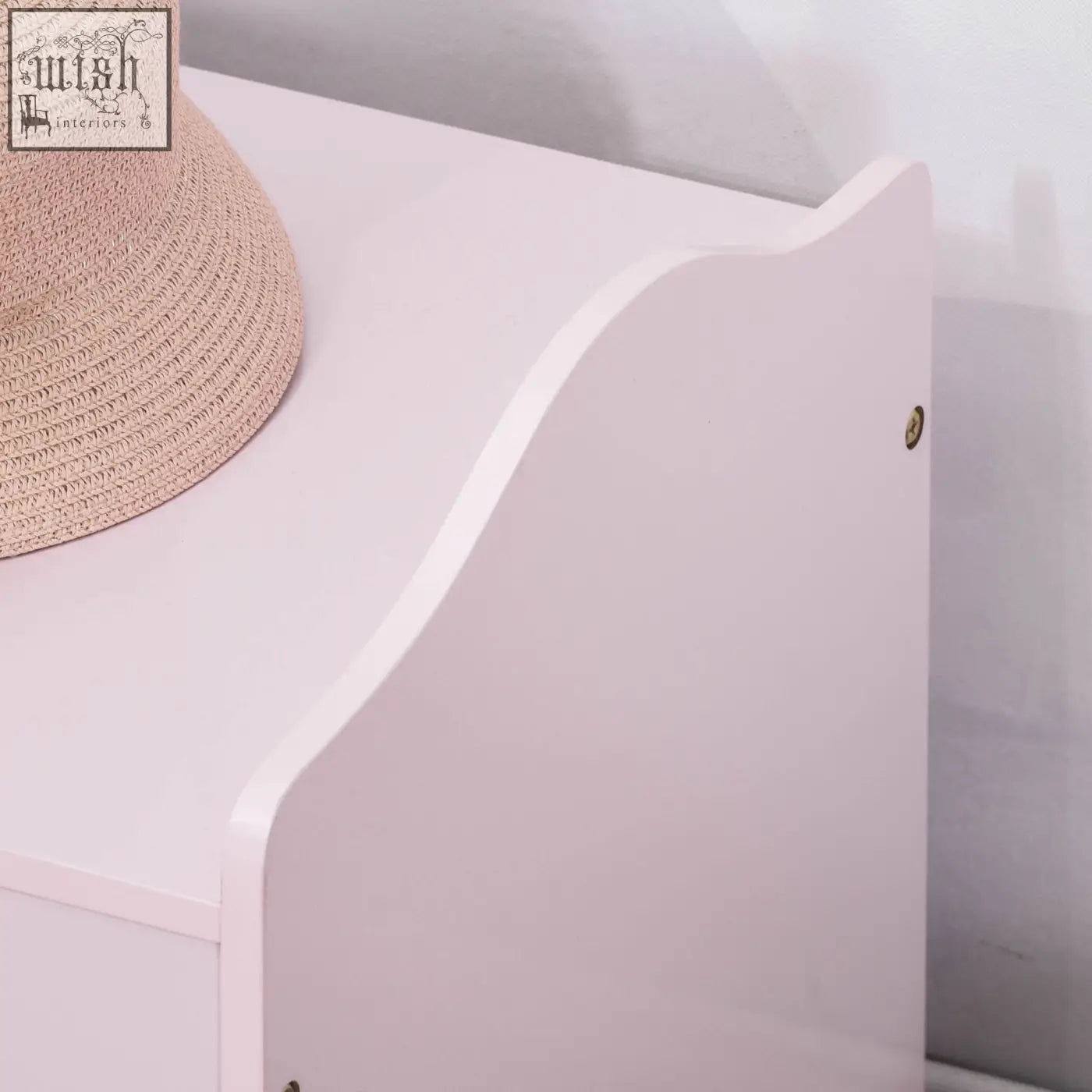 A soft pink wooden kids toy box with smooth surface and curved edge featuring a safety pneumatic rod for safe use