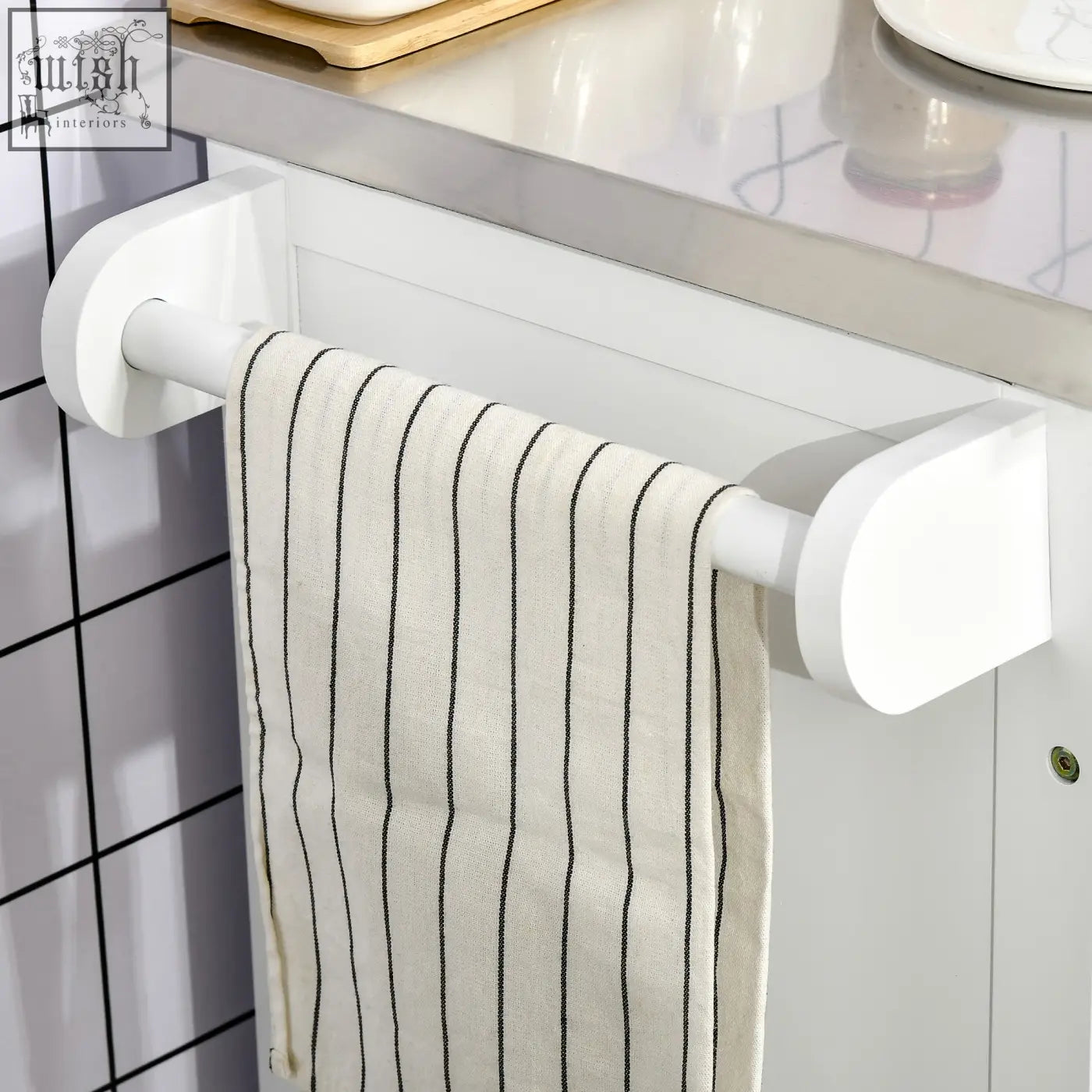 Cream-colored towel with black stripes hangs on white plastic towel rail attached to homcom kitchen island with stainless steel top