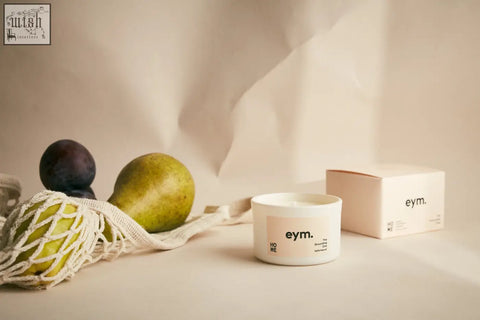 White ceramic mini candle with minimalist eym label perfect for cozy home decor and relaxing ambiance