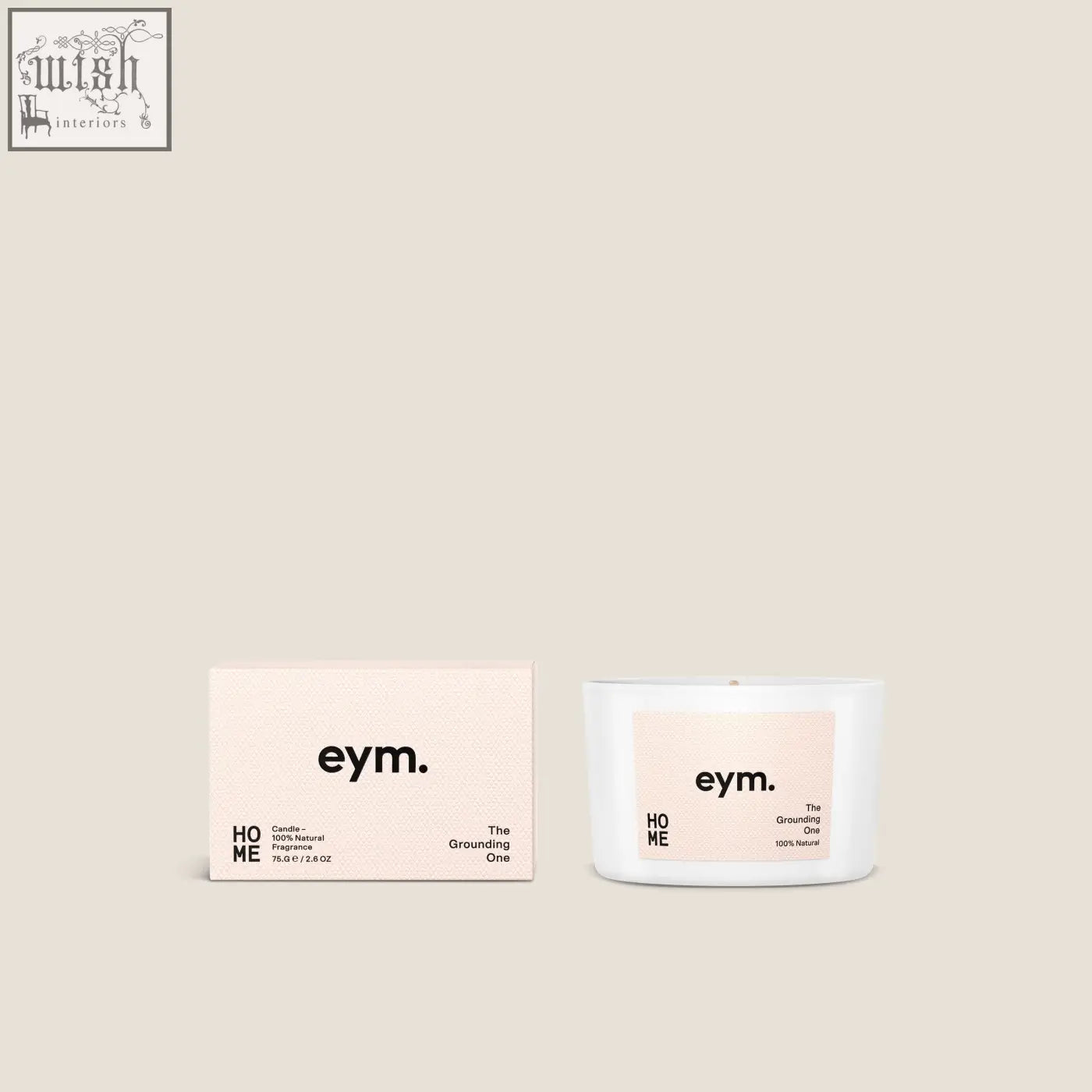 White ceramic mini candle with pale pink label and black text next to its minimalist matching box for home decor