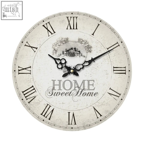 Vintage-style home sweet home wall clock with distressed off-white face black roman numerals and ornate hands