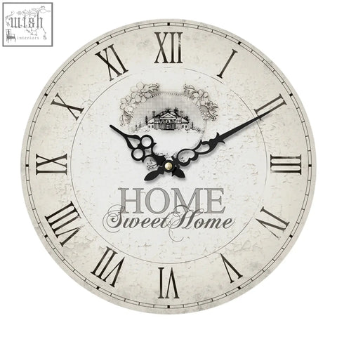 Vintage-style home sweet home wall clock with distressed off-white face black roman numerals and floral house design