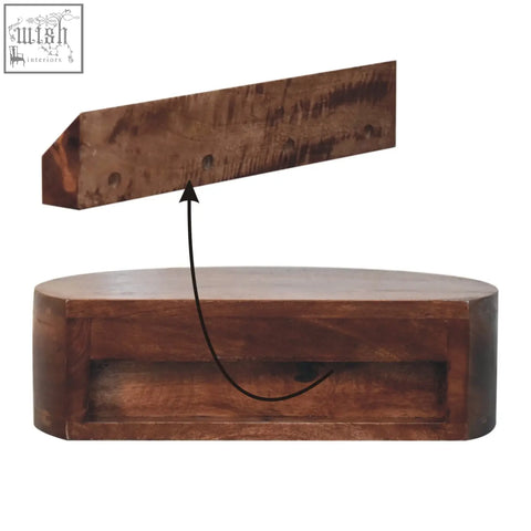 Rustic brown wooden coffee table with a single drawer and angled top lid in honey caramel finish rounded bedside style
