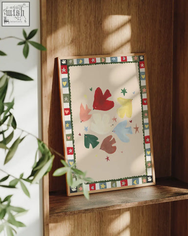 A hope bird art print featuring colorful red yellow blue and green birds with a scandi folk border of stars and hearts
