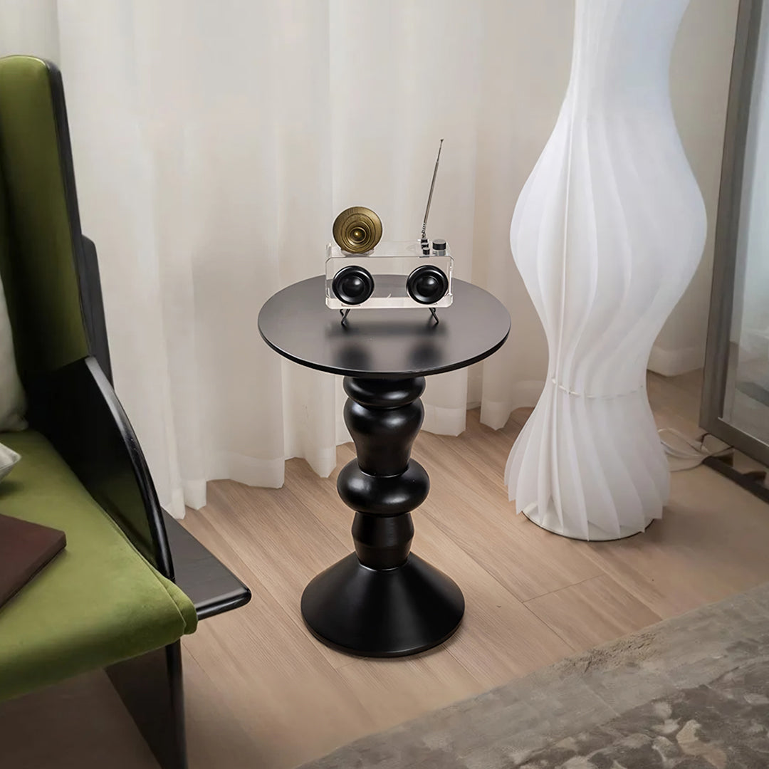 Black round Horace side table with turned-wood design and glossy finish made from ash wood
