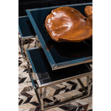 Stacked modern nesting tables with black glass tops and chrome frames in the horizon silver coffee table set