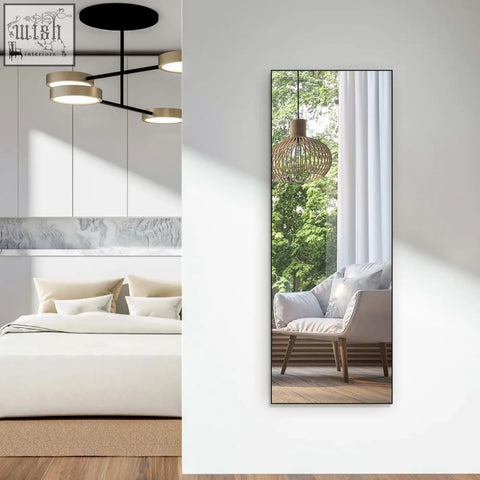 Horlimer 65x24 inch full length long mirror with black frame reflecting cozy living room for free standing or wall hanging