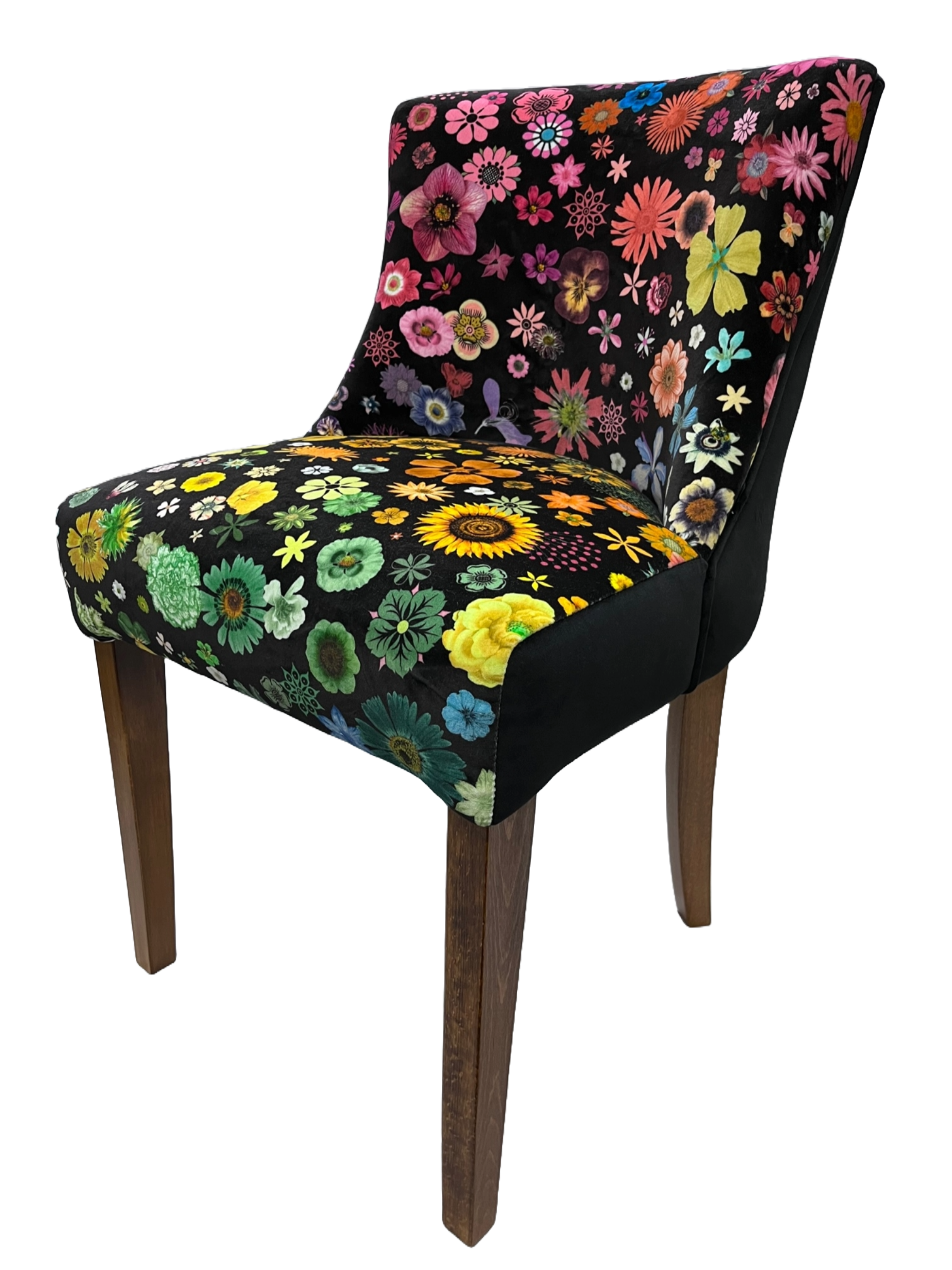 A vibrant floral-patterned horton chair with black base and wooden legs perfect for stylish living spaces