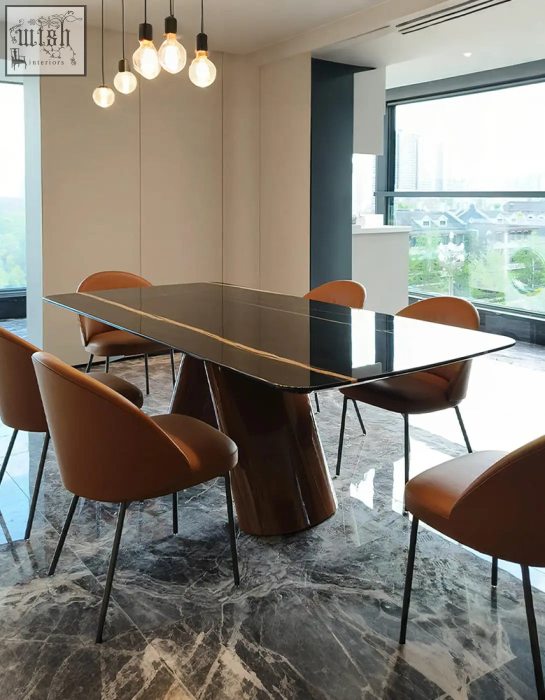Modern black glass dining table with curved base paired with warm brown leather chairs for stylish marble dining spaces