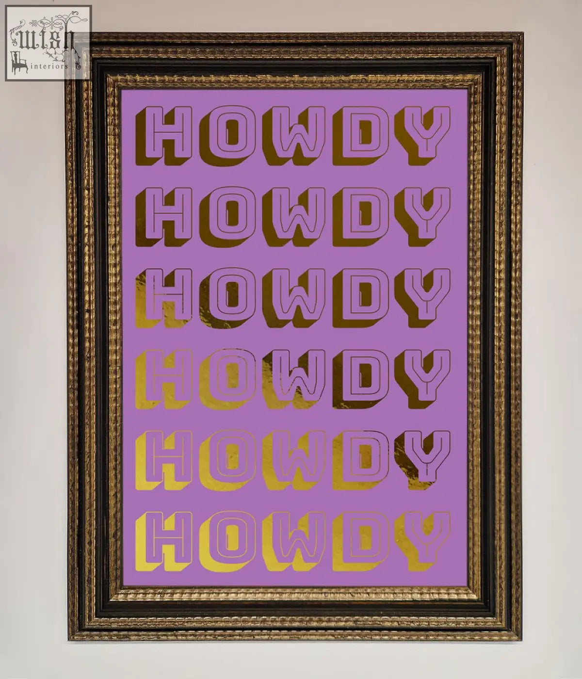 A framed howdy foil print with bold stylized howdy text across six rows on a lavender background
