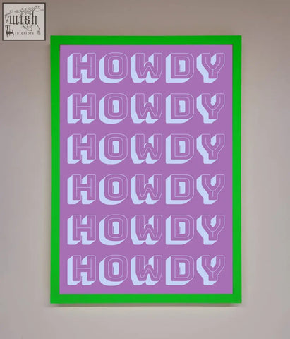 A vibrant pink howdy framed poster with bold white repeated text and a bright green border for wall decor