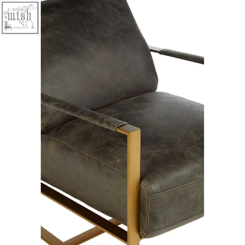 Hoxton grey leather lounge chair with gold finish frame in dark grey leather and rose gold metal details
