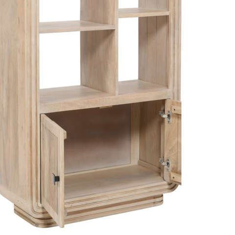 Light-colored hudson carved mango wood bookcase with open cubbies and two doors one slightly ajar