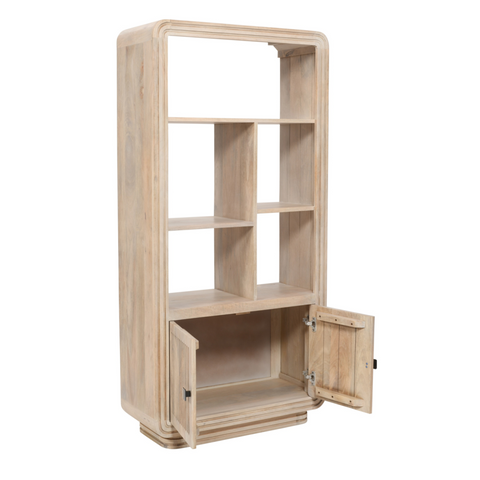 Light-colored hudson carved mango wood bookcase with modern curved design and two doors at the bottom