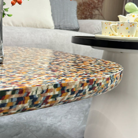 Colorful mosaic patterned wood coffee table with glossy tile surface and rounded edges from hughes nesting set for single sofa bed use