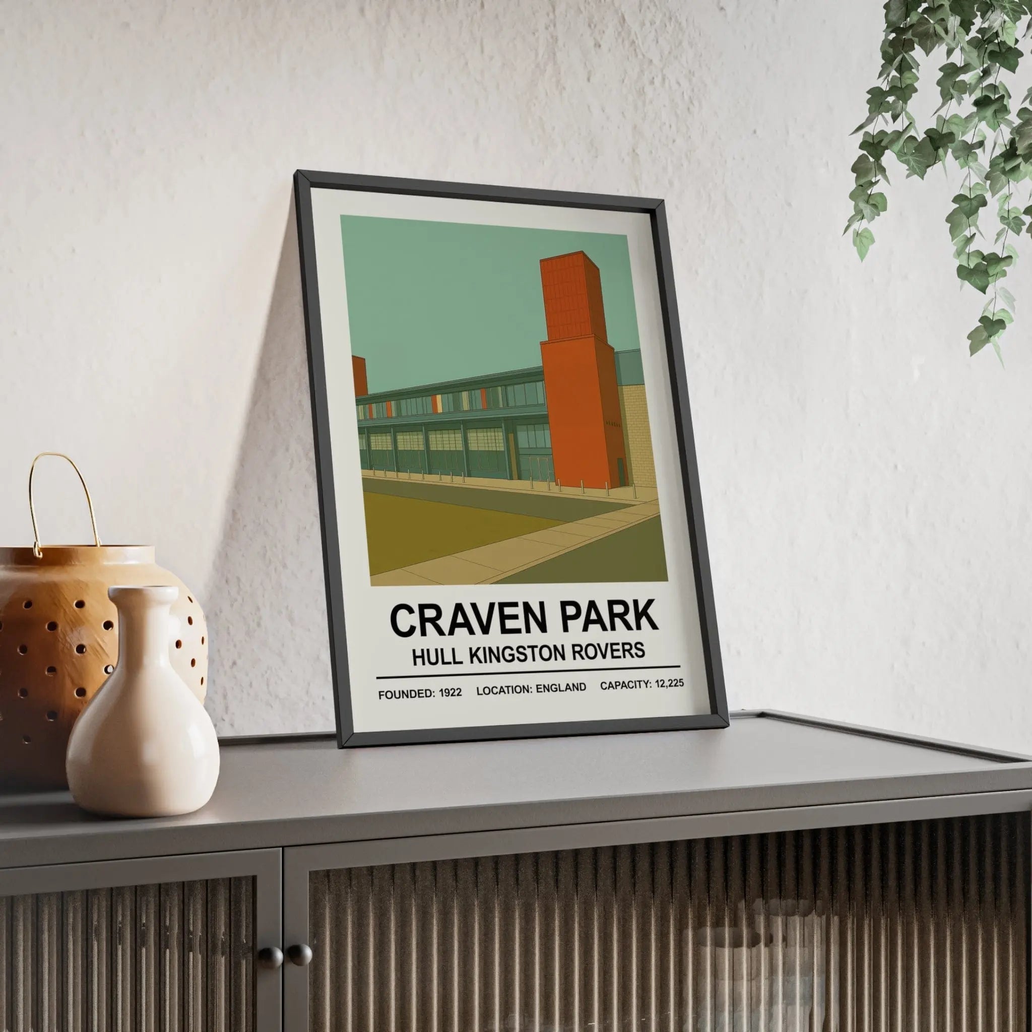 A framed poster print of craven park stadium with vibrant orange details and bold text for hull kingston rovers fans