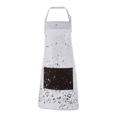 White hygge apron with black speckles, solid black pocket, and adjustable fit for cozy cooking sessions