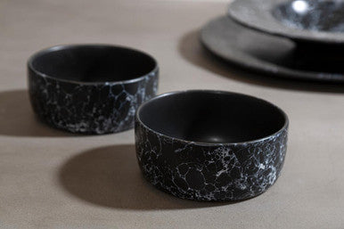 Black faux marble bowl set featuring black ceramic with a white marbled pattern perfect for hygge decor