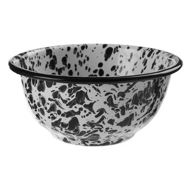 Black and white speckled small metal bowl with glossy enamel finish perfect for cozy hygge vibes