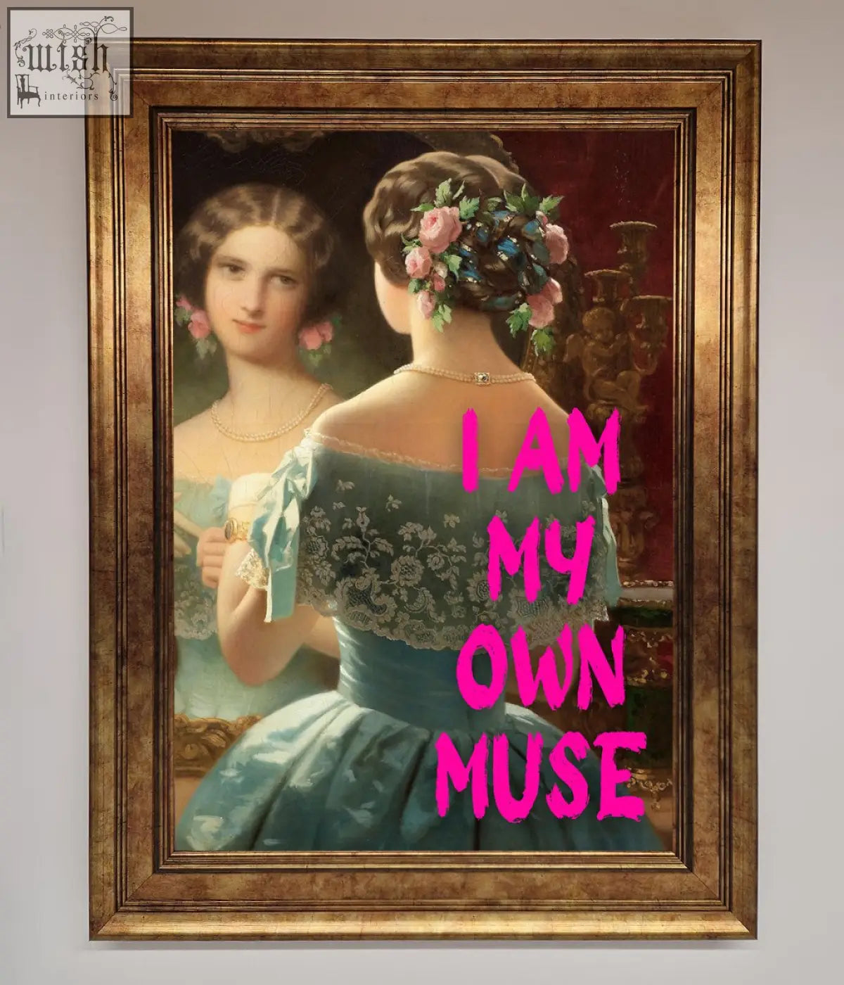 A framed print of a woman in a teal lace gown with floral hair adornments titled i am my own muse muse framed print