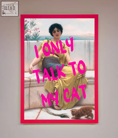 Framed wall art of a woman in a yellow dress with an orange cat and bold pink text i only talk to my cat wall art