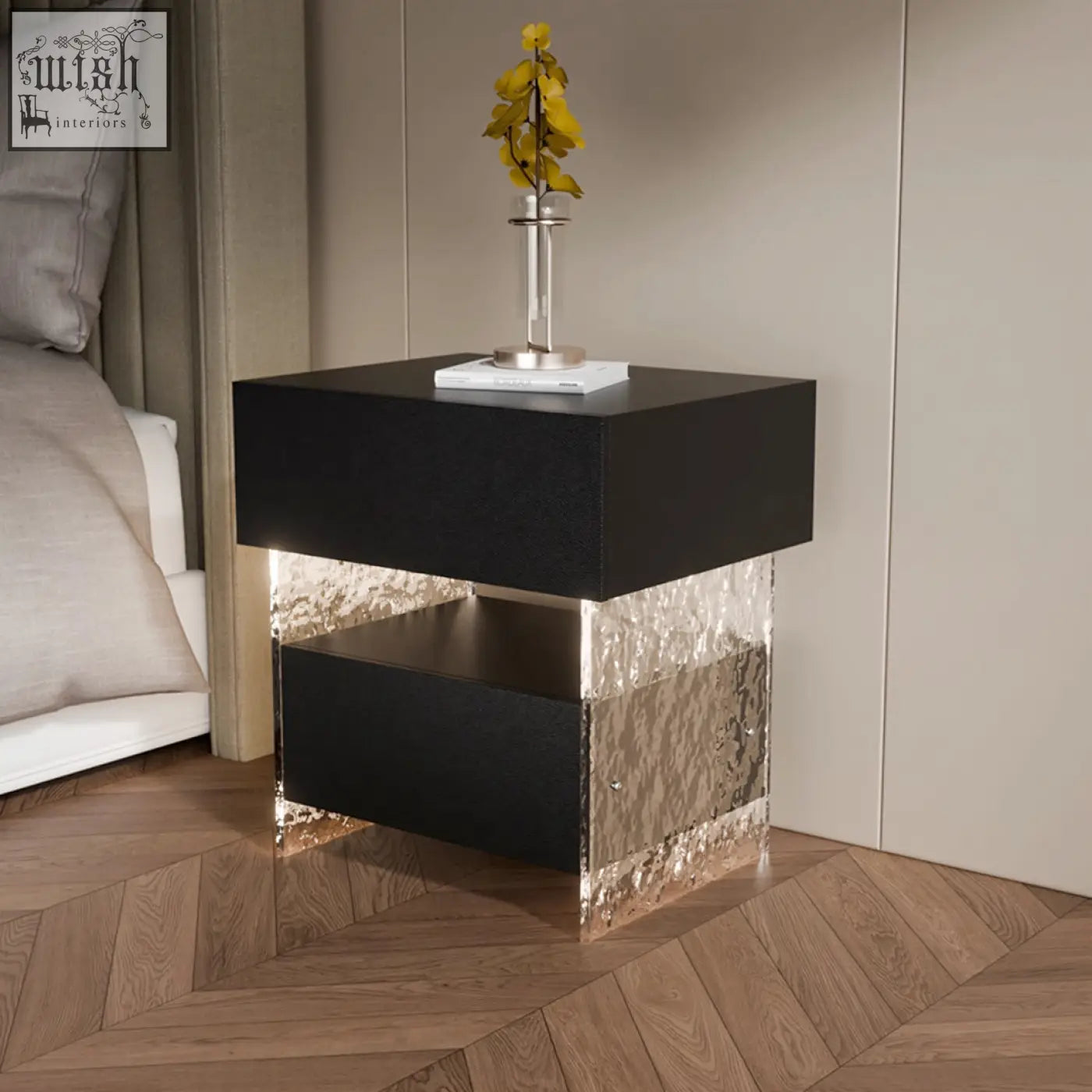 Black and silver ibarra bedside table with glossy black top, textured metallic sides, and open shelf for storage and light strip