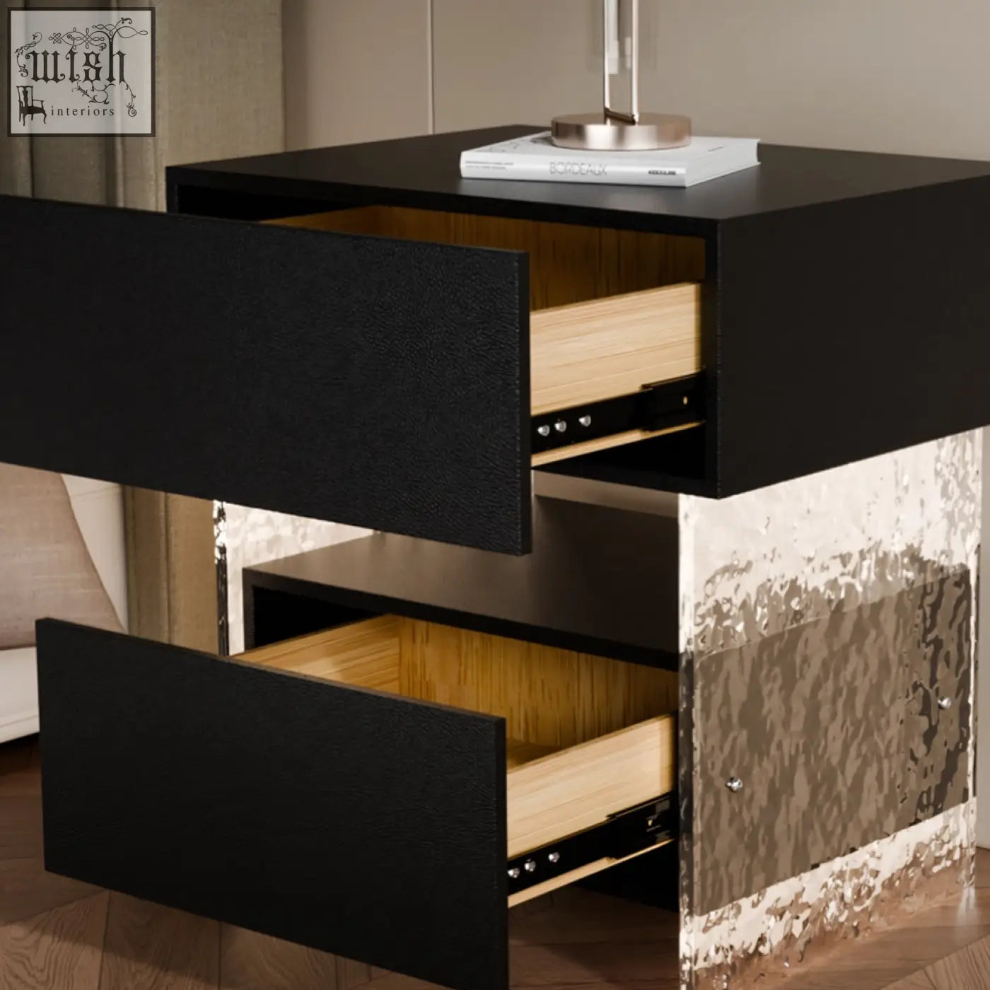 Modern black ibarra bedside table with textured drawer fronts and distressed metallic base with light strip storage