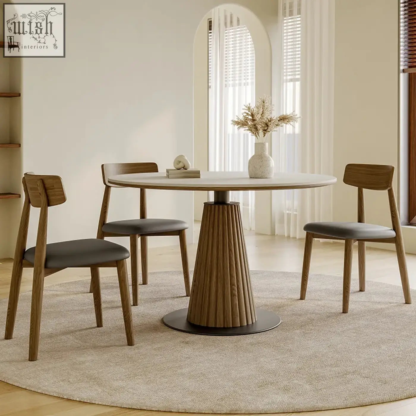 Ichiro dining table with a round tabletop featuring a light stone top and fluted wooden base for stylish dining