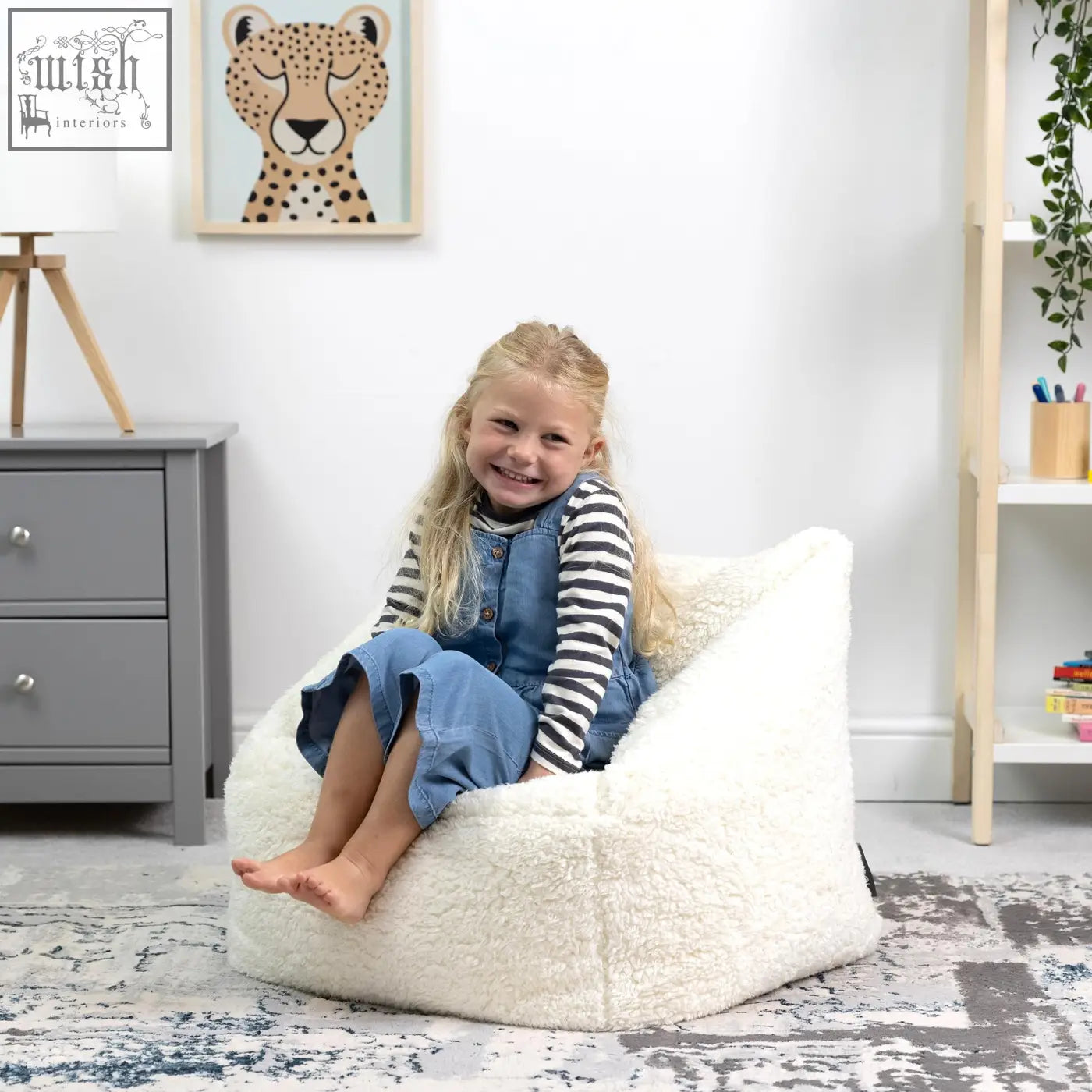 Cream kids bean bag chair in fluffy teddy fleece with plush sheepskin texture perfect for cozy nursery dcor