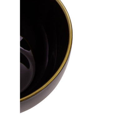 Ida black glass bowl with gold rim featuring a sleek black ceramic design and elegant gold rim detail