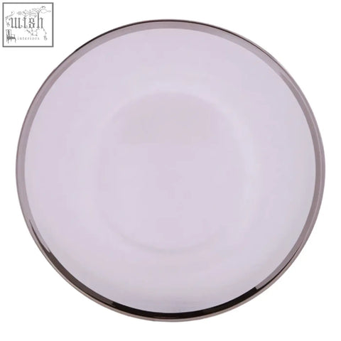 Ida glass charger plate featuring a sleek white ceramic design with a polished silver rim for elegant table settings