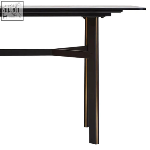 Black matte rectangular dining table with ceramic marble effect top and sleek minimalist legs perfect for modern dining