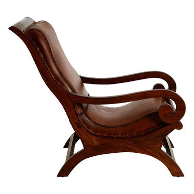 Inca brown leather and teak wood lounge brown chair with carved wooden frame and curved armrests and footstool