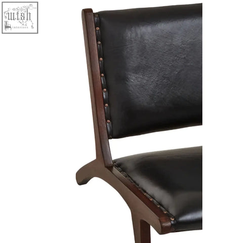 Inca genuine black leather lounge chair with dark wood frame and brass nailhead trim for stylish seating