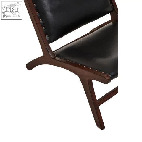 Inca genuine black leather lounge chair with dark wood frame and brass nailhead trim for stylish comfort